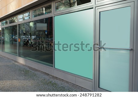 Building Exterior With Glass Window And Closed Door