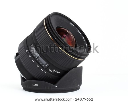 Wide-angle lens for DSLR camera over white background