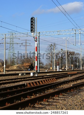 Rail tracks and  semaphores in sunny day