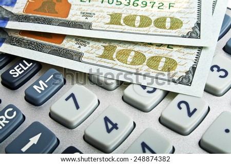 Business concept - calculator and money