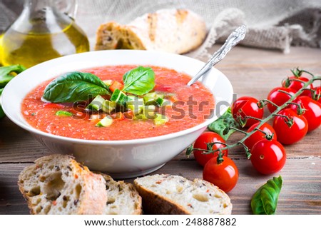 Tomato gazpacho soup with pepper and garlic, Spanish cuisine Royalty-Free Stock Photo #248887882