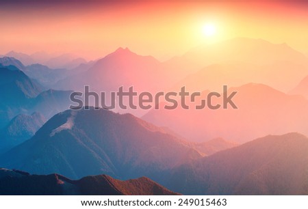 Great sunrise in a Carpathian mountain valley