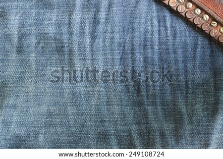 denim jean texture background with leather belt