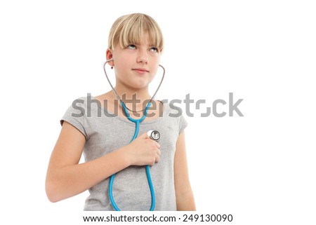 Girl checking herself with a stethoscope