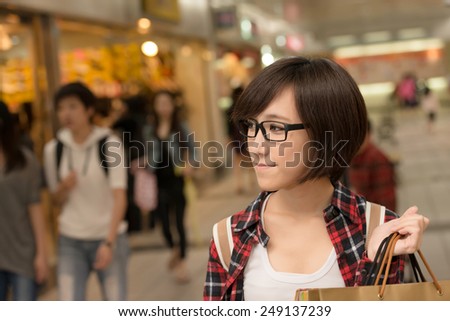 Shopping young girl of Asian at mall in Taipei, Taiwan.