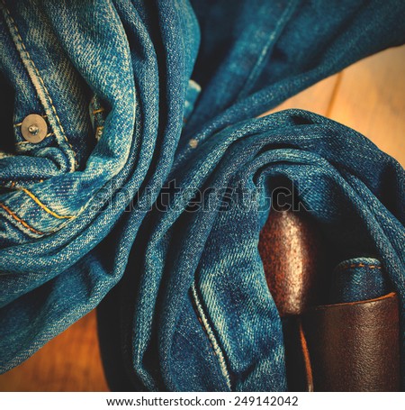 rolled-up blue denim jeans. instagram image style