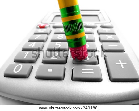 Closeup of a pencil pushing buttons on a calculator