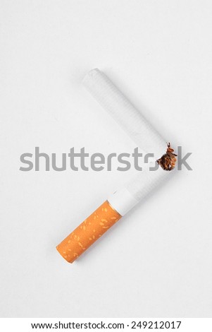Stop Smoking, Broken cigarette isolated on white background - World No Tobacco Day