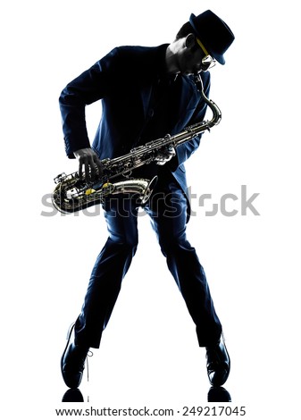 one caucasian man  saxophonist playing saxophone player in studio silhouette isolated on white background Royalty-Free Stock Photo #249217045