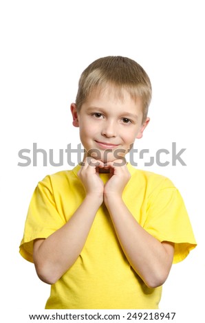 Boy making heart symbol with hands