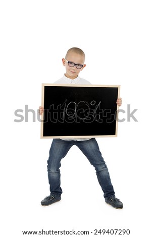 Young boy holding a blackboard against a white background
