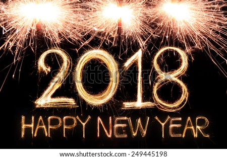 Happy new year 2018 written with Sparkle firework Royalty-Free Stock Photo #249445198