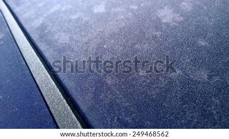 roof of a car in the frost with a rain chanel to the left