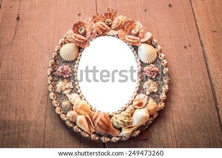 Frame picture made from shells.