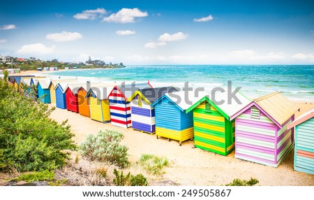 Beautiful Bathing houses on white sandy beach at Brighton beach in Melbourne, Australia. Royalty-Free Stock Photo #249505867