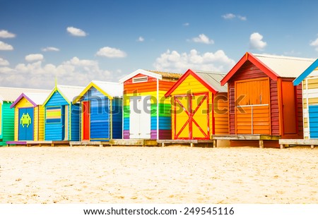Beautiful Bathing houses on white sandy beach at Brighton in Melbourne, Australia. Royalty-Free Stock Photo #249545116