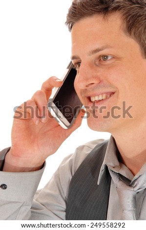 A closeup picture of the face of a man talking on his cell phone, isolated for white background. 