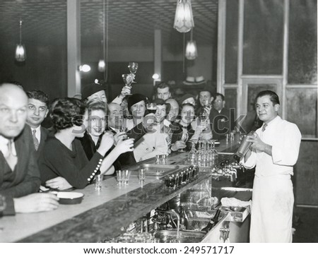 Customers at a Philadelphia bar after Prohibition's end, Dec. 1933. Royalty-Free Stock Photo #249571717