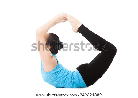 Sporty yoga girl on white background in dhanurasana (Bow Pose), Urdva Chakrasana (Upward Wheel Pose)