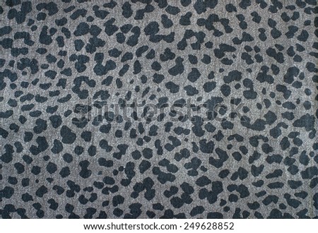 Grey leopard pattern. Spotted animal print as background.