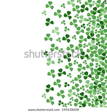 St Patricks Day border or background of green shamrocks over white