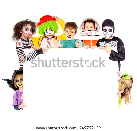 group of little kids with scary costumes on halloween isolated in white