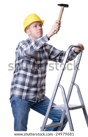 Full isolated studio picture from a young craftsman on a ladder with a hammer