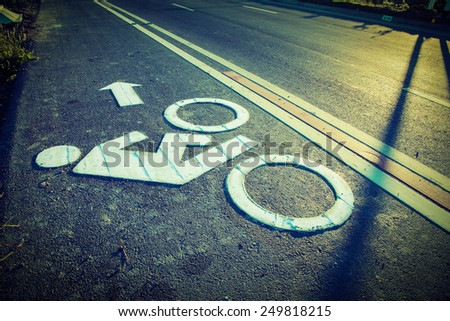 Bike lane sign on the road in country side of Thailand, Vintage