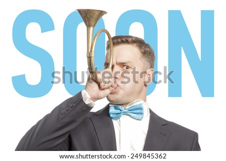 Funny man in blue bow tie blowing into the trumpet with title