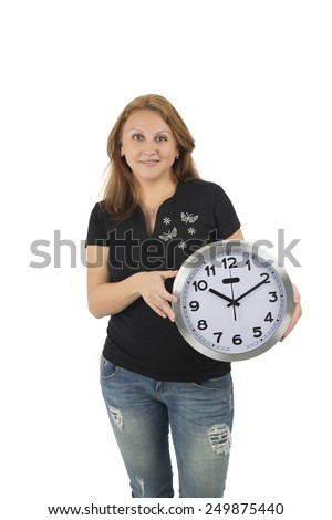 Young woman holding a clock against a white background