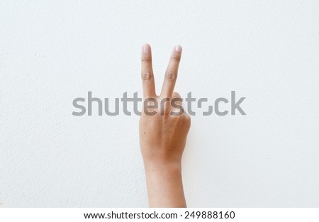 isolated female hand peace sign