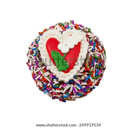 Delicious Cupcake with heart on a white background