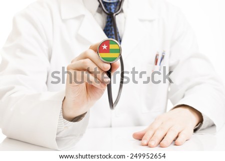 Doctor holding stethoscope with flag series - Togo