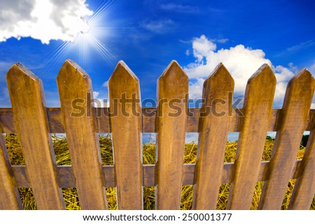 garden fence with a empty sign 