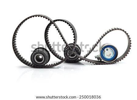 Timing belt, two rollers and the tension mechanism. Isolate on white background. Royalty-Free Stock Photo #250018036