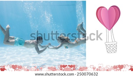 Cute couple holding hands underwater in the swimming pool against heart hot air balloon
