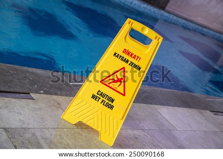wet floor sign (turkish and english)