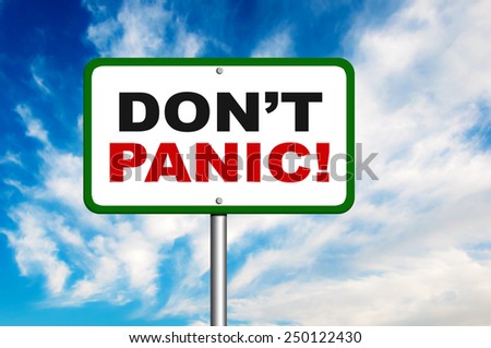 Don't panic road sign with a blue sky in a background