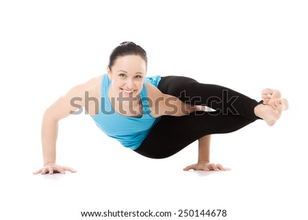 Sporty yogi girl doing fitness exercises, yoga asana Astavakrasana, asymmetrical arm balance Eight-Angle Pose, isolated on white background