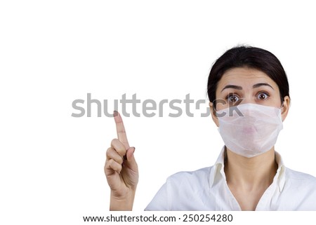 Female doctor with protective mask pointing up.Hospital,Prevention,Stop,Medical,Hospital,Danger on white background.