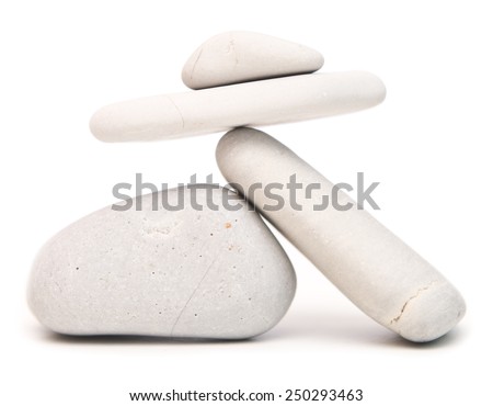 white balancing stones isolated on white background