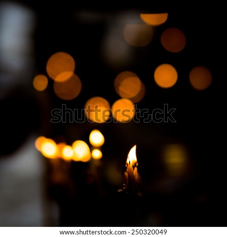 Dramatic candle light in Temple.