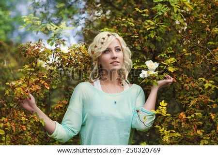 Young woman in the bushes with bleeding