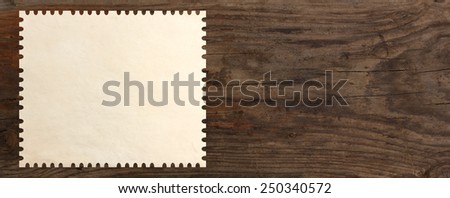 paper stamp post old wooden table background Royalty-Free Stock Photo #250340572