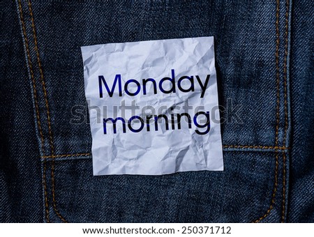 The inscription on the crumpled paper on jeans background. Monday morning