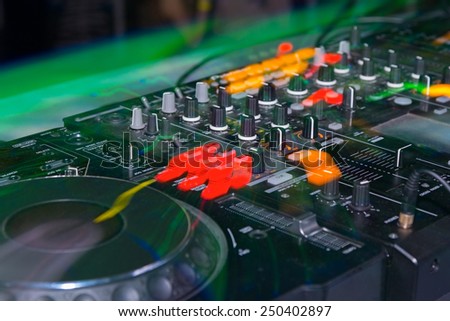 DJ stand in the club glow
