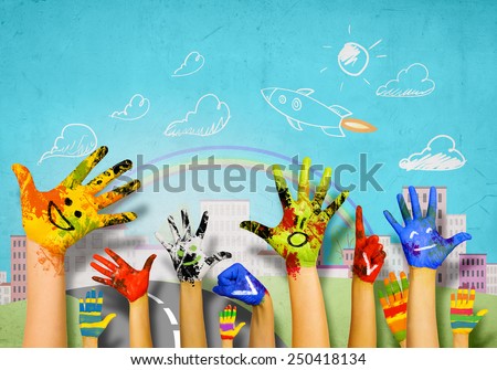 Human hands in colorful paint showing symbols Royalty-Free Stock Photo #250418134