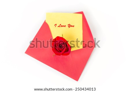 Love Letter. Red rose with yellow paper of letter and red envelope, isolated on white background, top view. Macro close up, selective focus. Concept of boyfriend or girlfriend missing other one. 