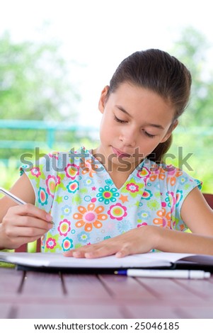 Young girl doing her homework.