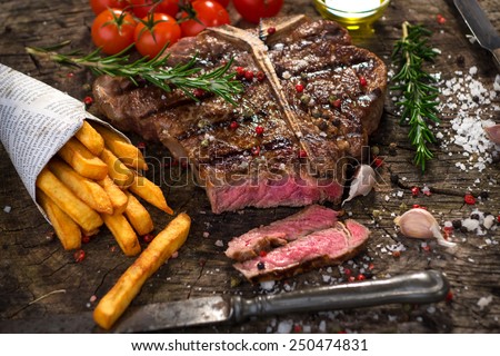 T-Bone Steak   Royalty-Free Stock Photo #250474831